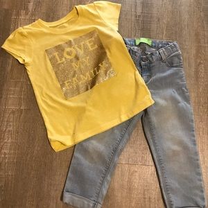 Love My Family top + faded-look denim jeans